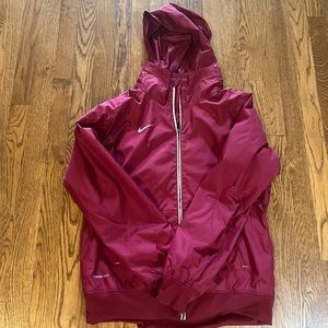 Nike Women’s Storm-Fit Raincoat. Maroon